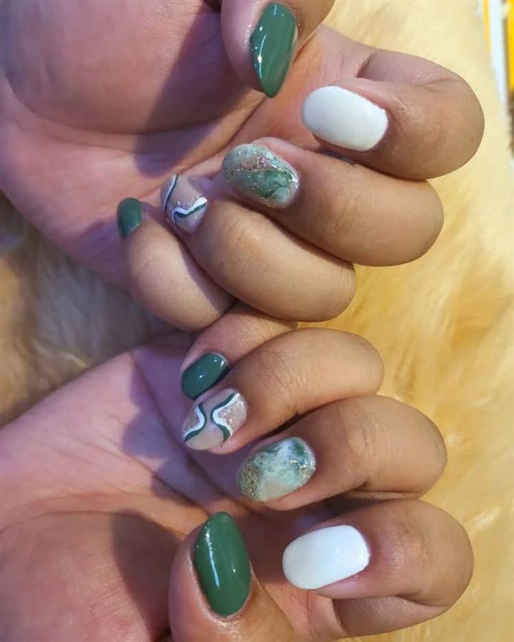 Green, white and marbled nail art